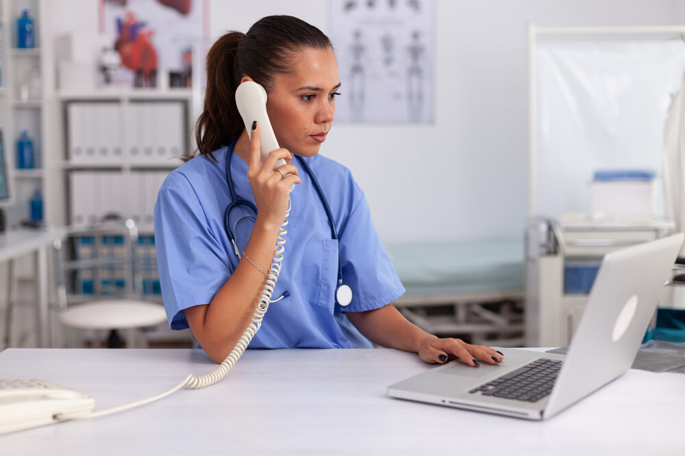 vet clinic receptionist on phone call